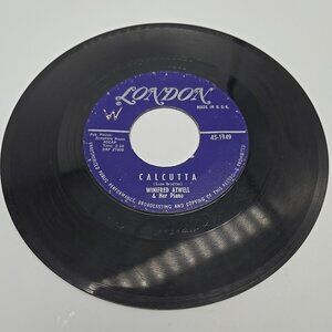 Calcutta / Melody In G Winifred Atwell and Her Piano 45 RPM Vinyl Record
